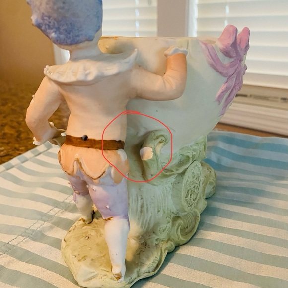Boy with cart figurine